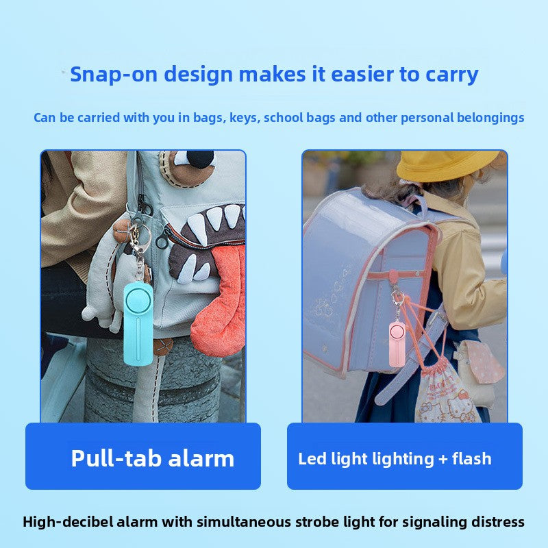 Personal alarm keychain in hand